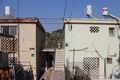 Givat HaMoreh - old but very affordable semi-private apartments where many avreichim live.jpg